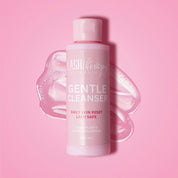 Bottle of Lash Therapy Gentle Cleanser on a pink background