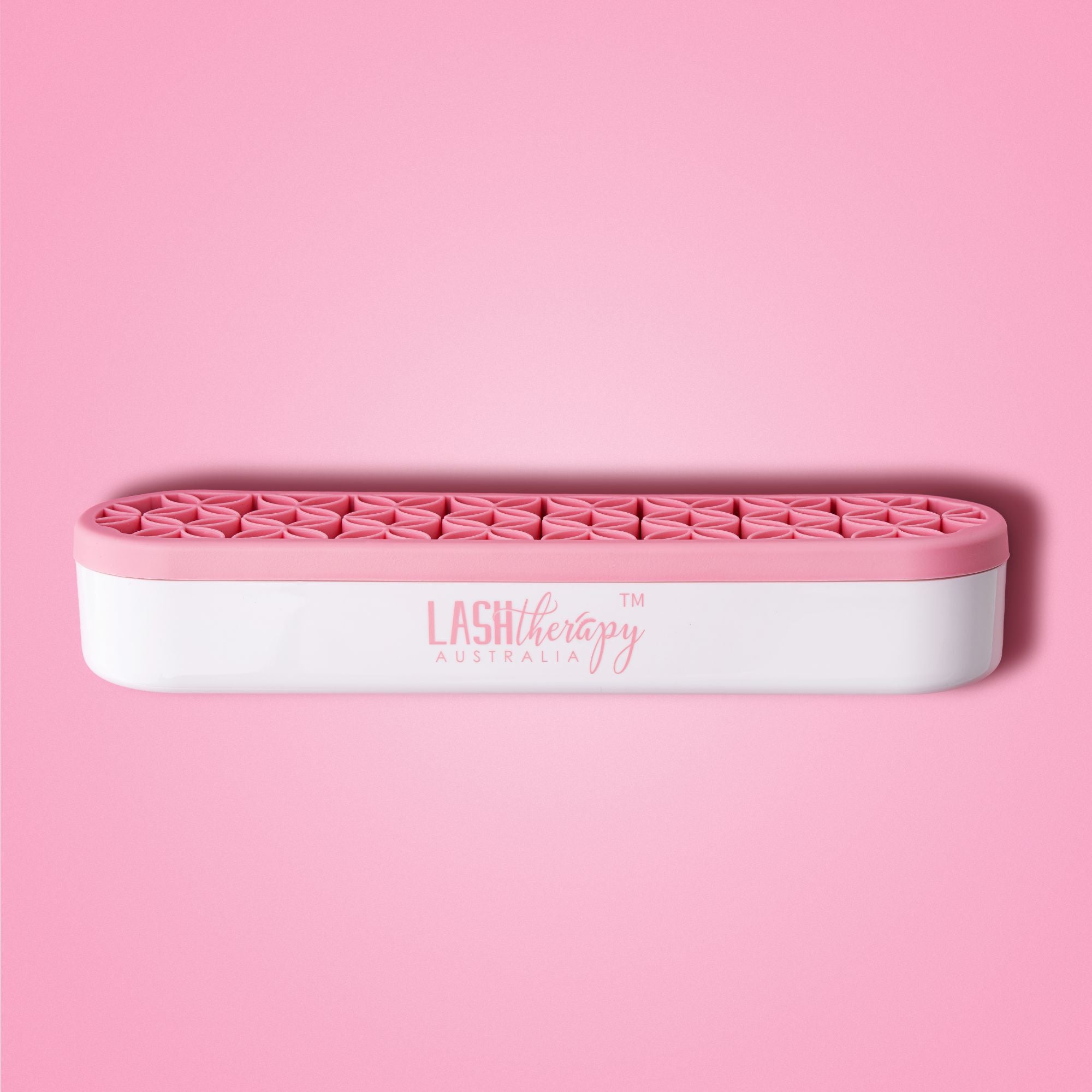 Pink and white lash storage case with 'Lash Therapy Australia' branding on a pink background