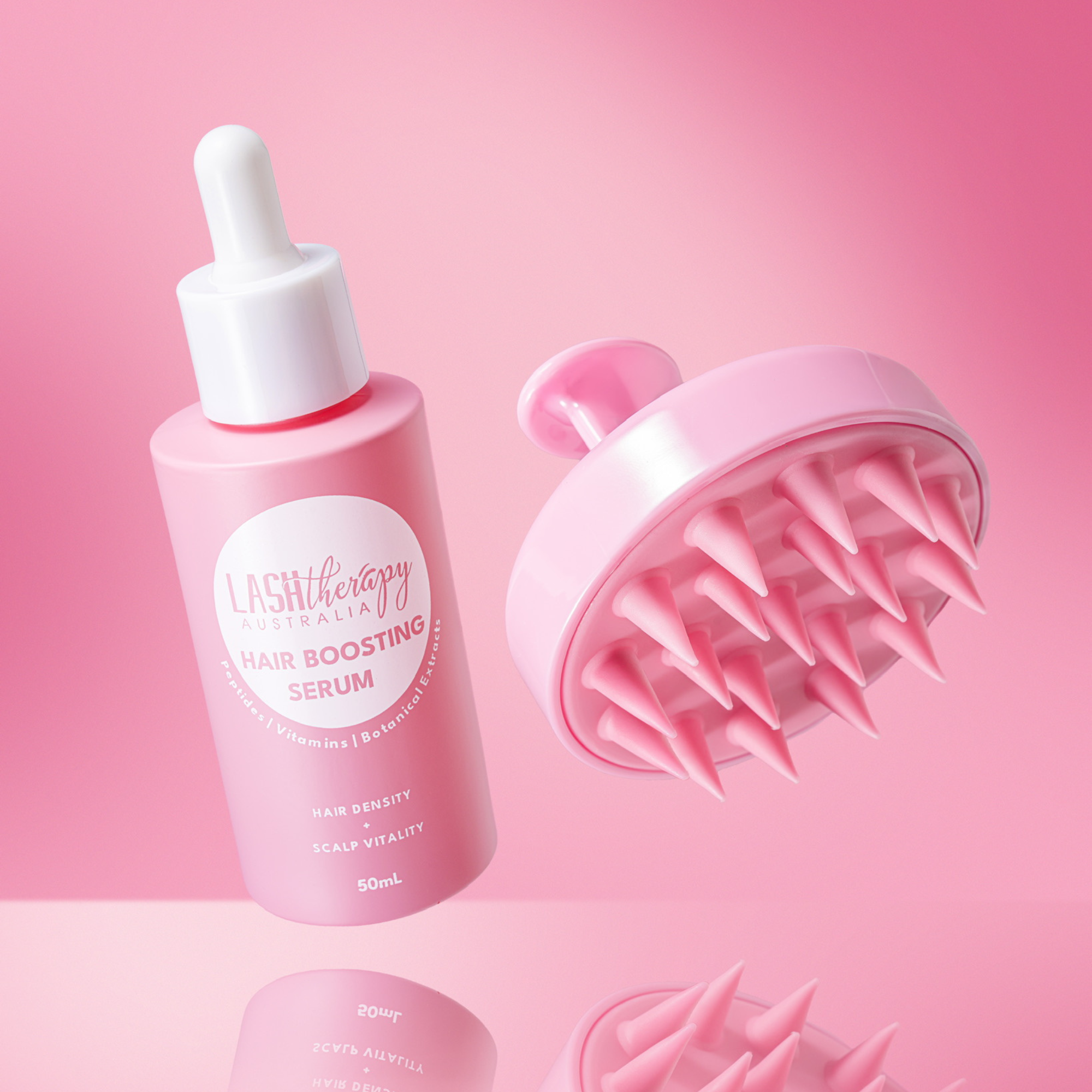 Lash Therapy Australia hair boosting serum with pink scalp massager for thicker, healthier hair.