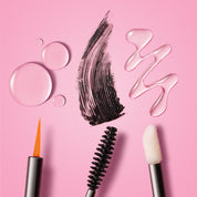 Lash Therapy Australia lash growth serum, brow growth serum and growth serum mascara applicators with product textures on pink background.